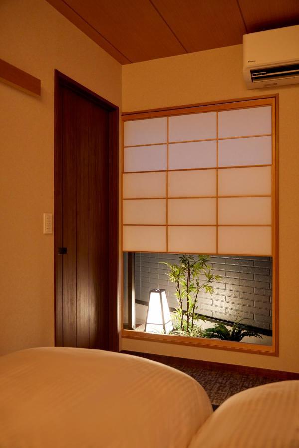 古今 天下茶屋 With A Private Parking Lot And A Half Open-Air Bath And Direct To Kix Villa Oszaka Kültér fotó